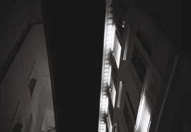 Nightime photo of a street in Rome