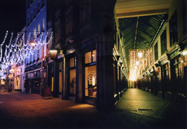 Nighttime photo of the Wyndham Arcade in Cardiff