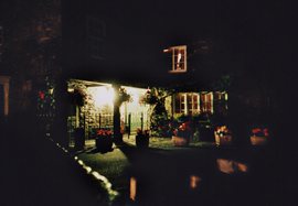 Nighttime photo of the front garden of house in Cartmel, Cumbria
