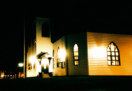 Nighttime photo taken at night of the Norwegian Church, Cardiff Bay