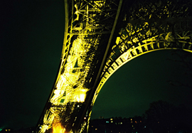Close-up photo of the Eiffel Tower taken at night